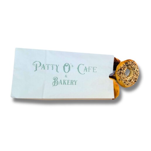 Photo of a paper bread bag with bagels inside.